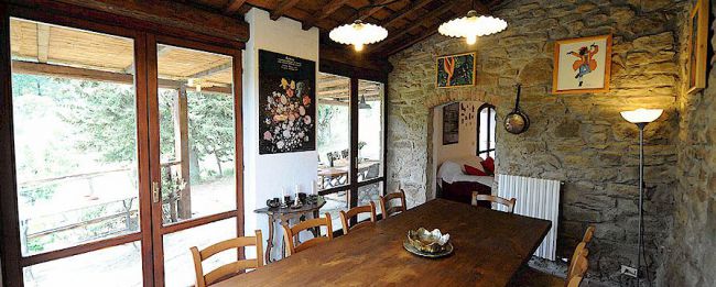 Speisezimmer im Casa al Monte di Sopra mit Zugang zur Loggia